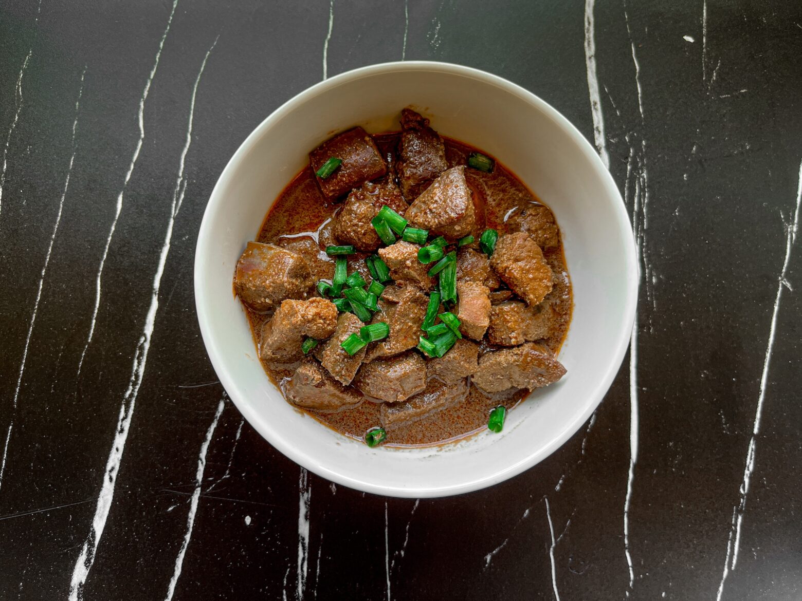Beef liver recipe finished, in a bowl.