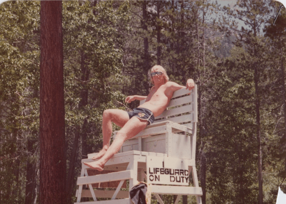Loren Cordain sitting on top of his lifeguard post