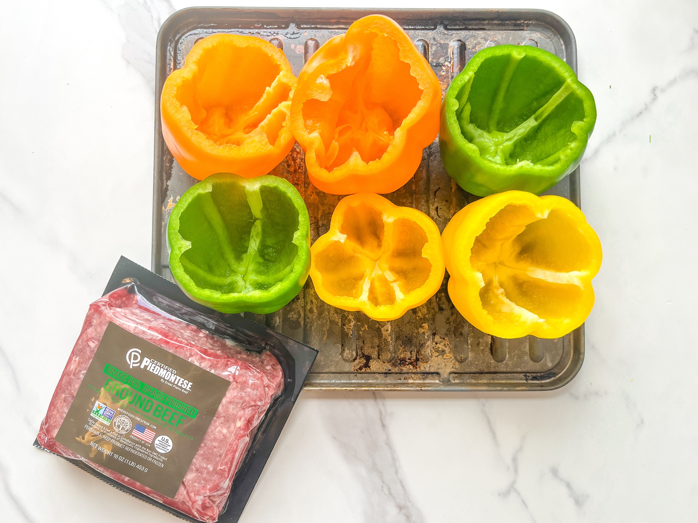Paleo stuffed peppers prep with ground beef. 