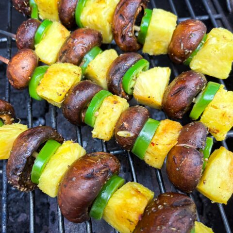Mushroom Shish Kabobs on the grill cooking.