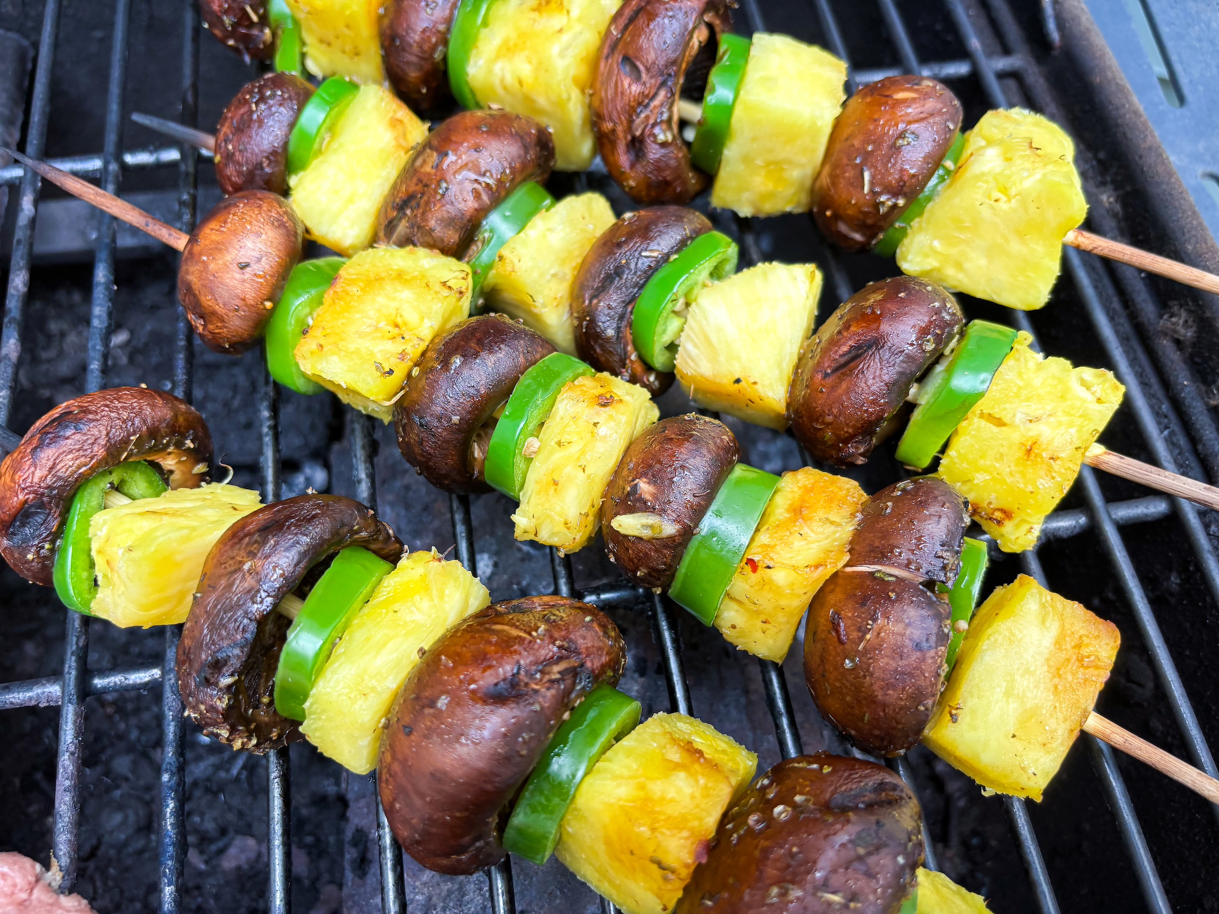 Mushroom Shish Kabobs on the grill cooking.