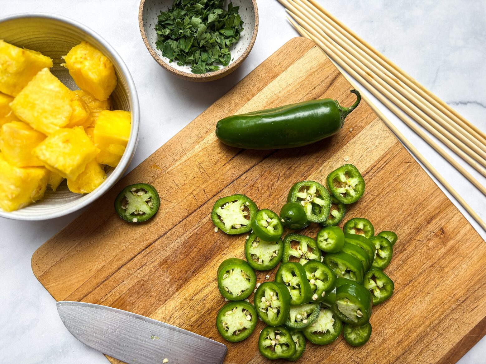 Mushroom Shish Kabobs prep, chopping the ingredients up.