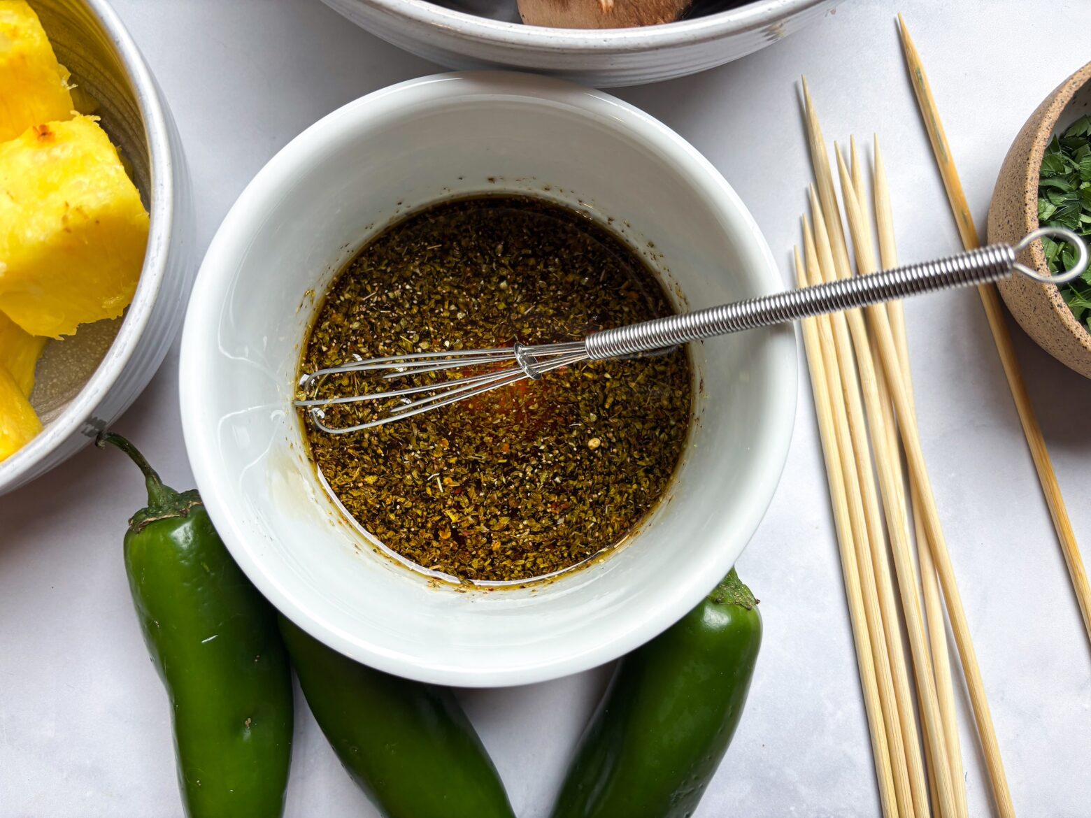 Mushroom Shish Kabobs mixing the marinade.