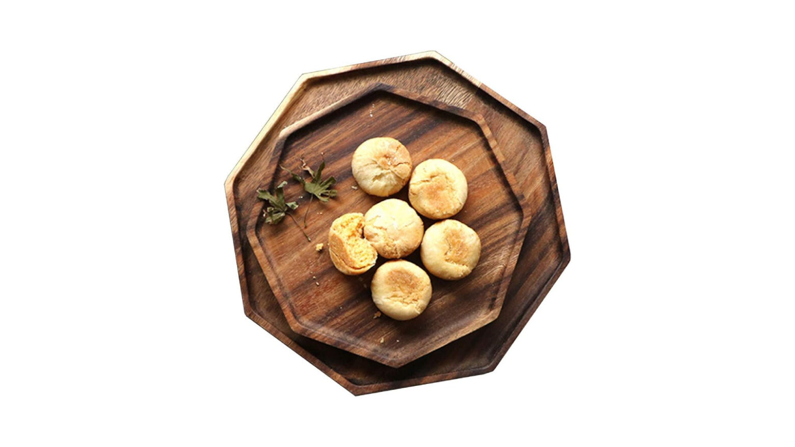 Two sizes of octagonal wooden platters stacked on top of each other