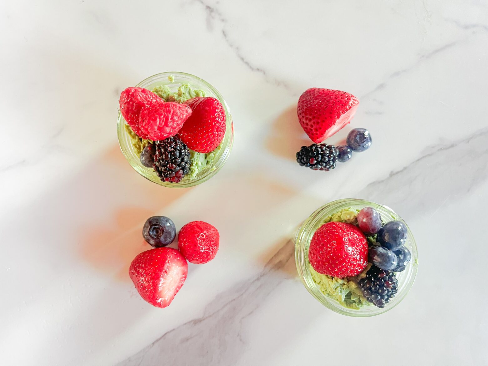 Above shot of matcha pudding cups finished.