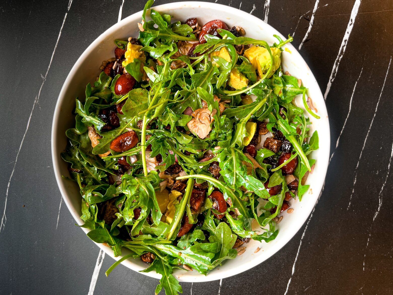Summer mason jar salad finished, in a bowl.