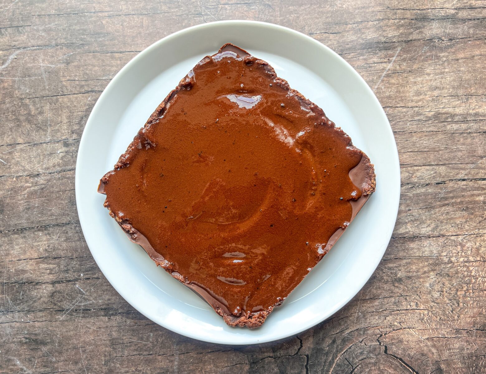 Homemade brownie bars prep on a plate.