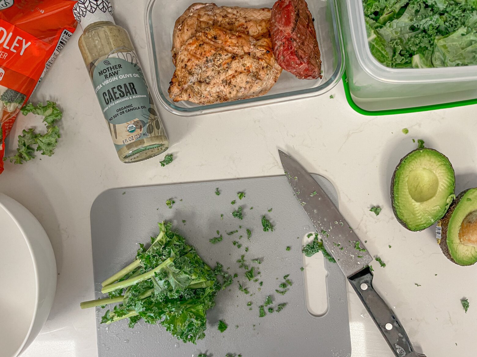 Quick lunch salad prepartion on a cutting board.
