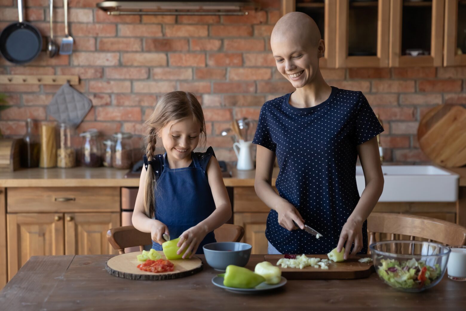 A mother and child preparing a healthy lunch together
