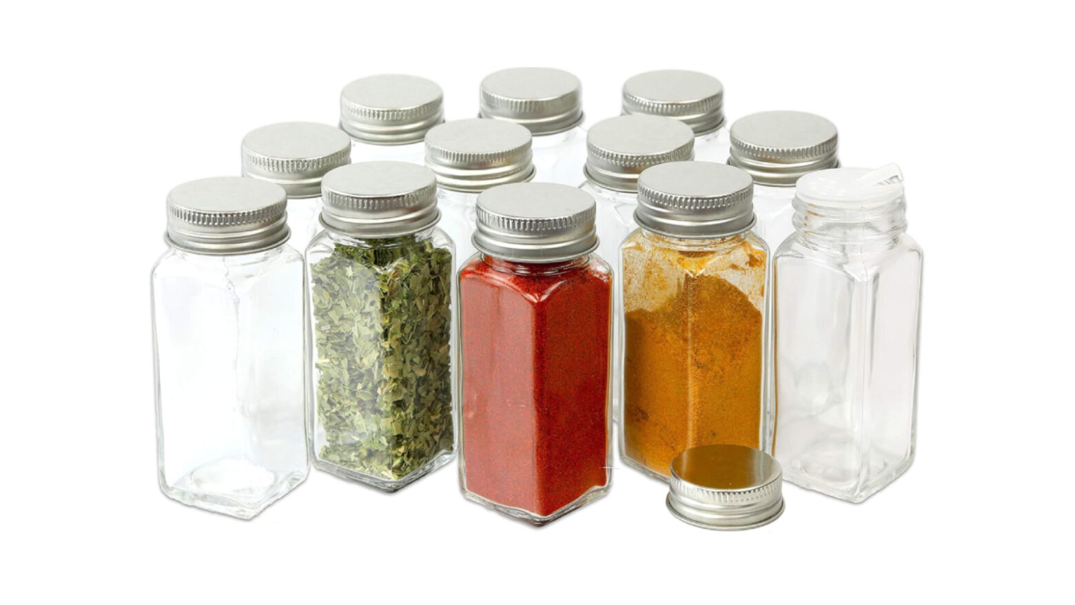 Spice jars in a row, with some filled and some empty.