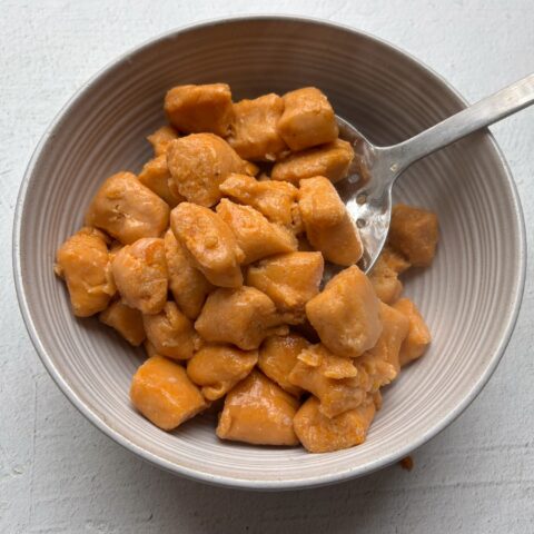 Sweet potato gnocchi finished in a bowl.
