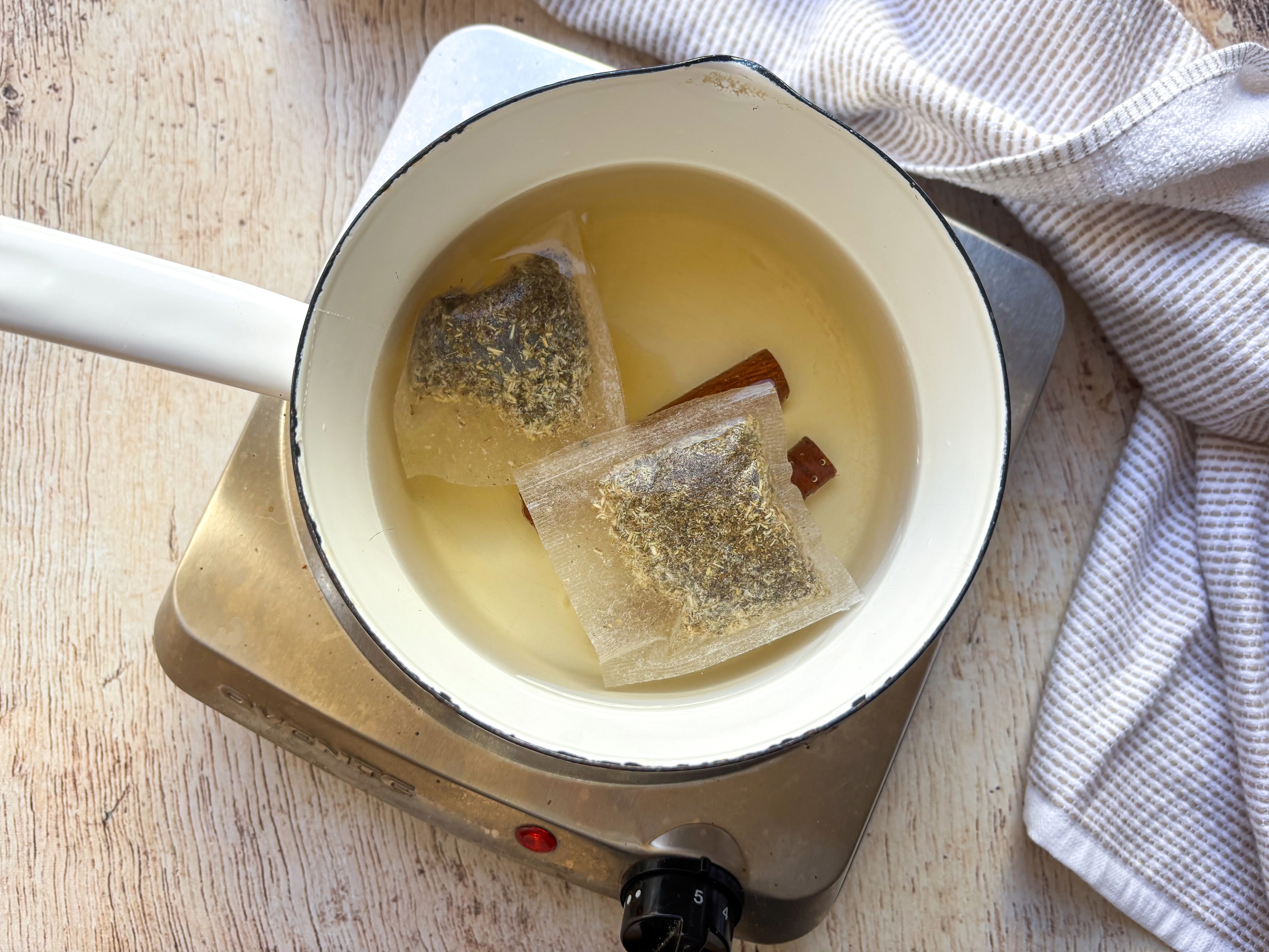 Chamomile Cinnamon Tea steeping in a pot.