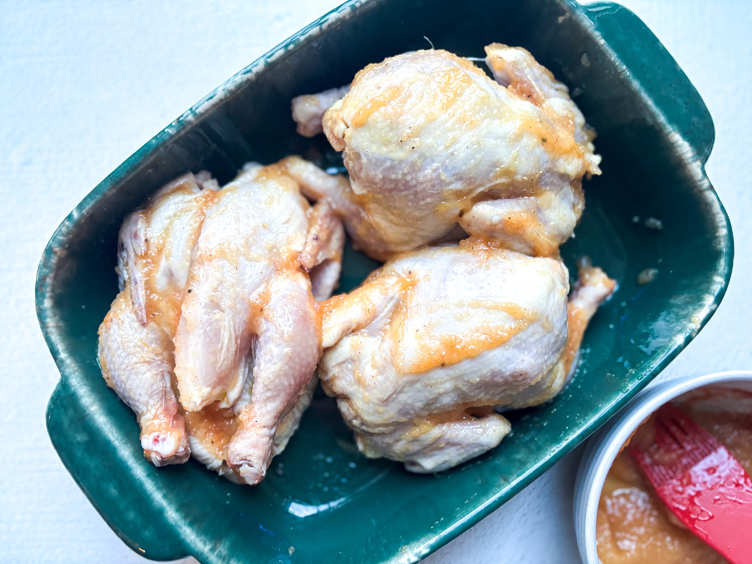 Cornish hens basted with applesauce mixture.