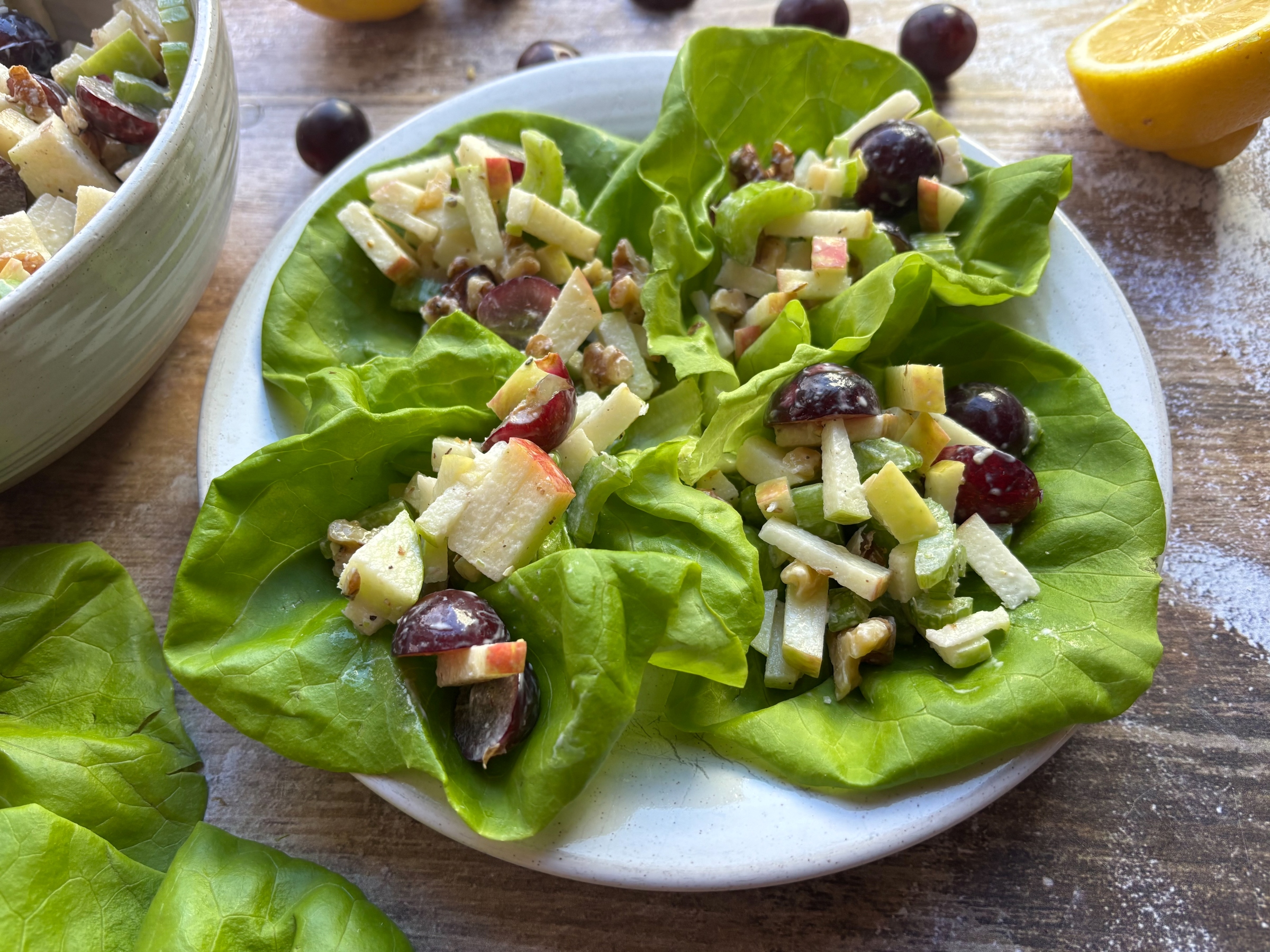 Finished Waldorf Salad served over butter lettuce.