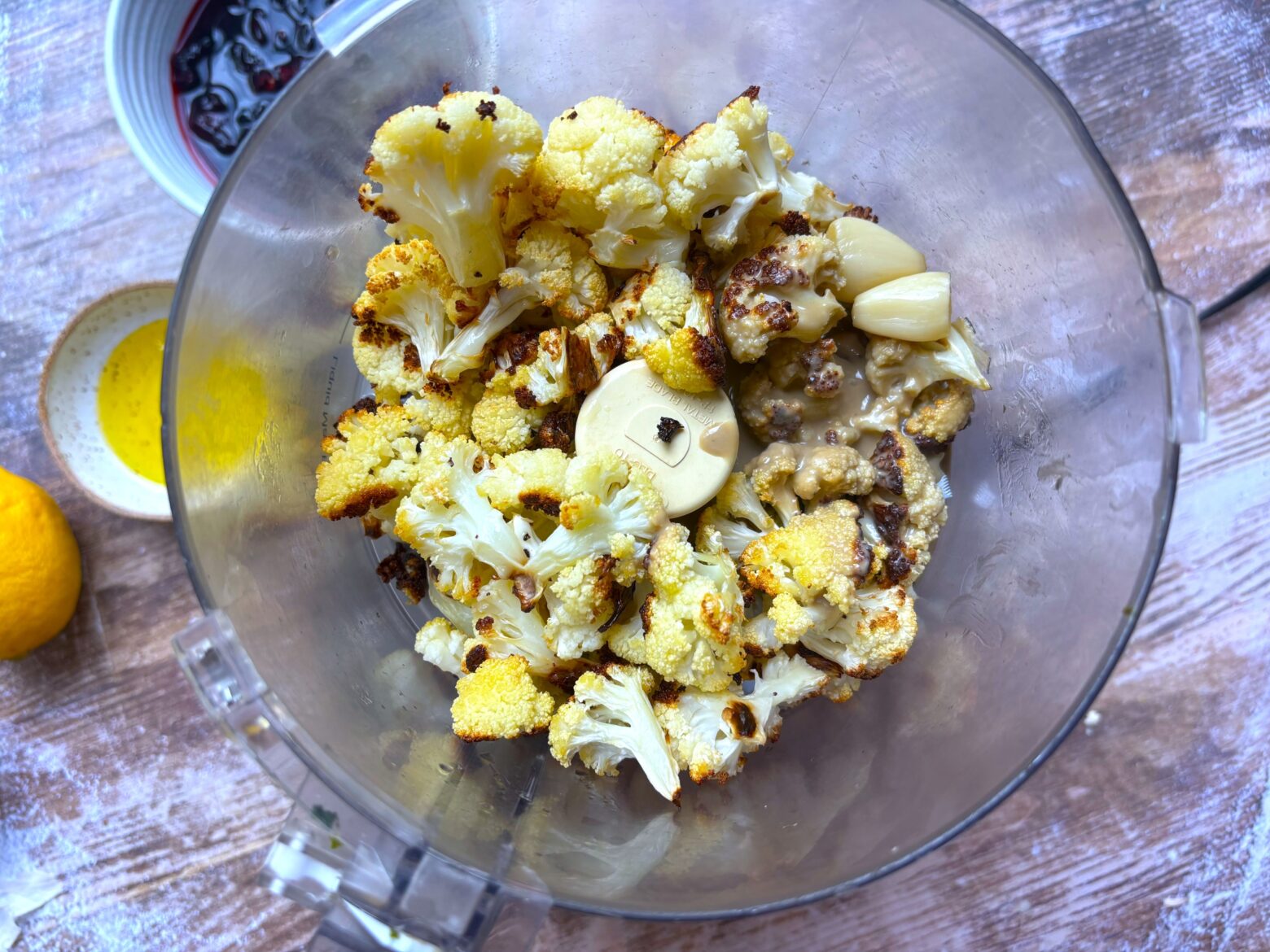 Roasted cauliflower and tahini in a food processor.