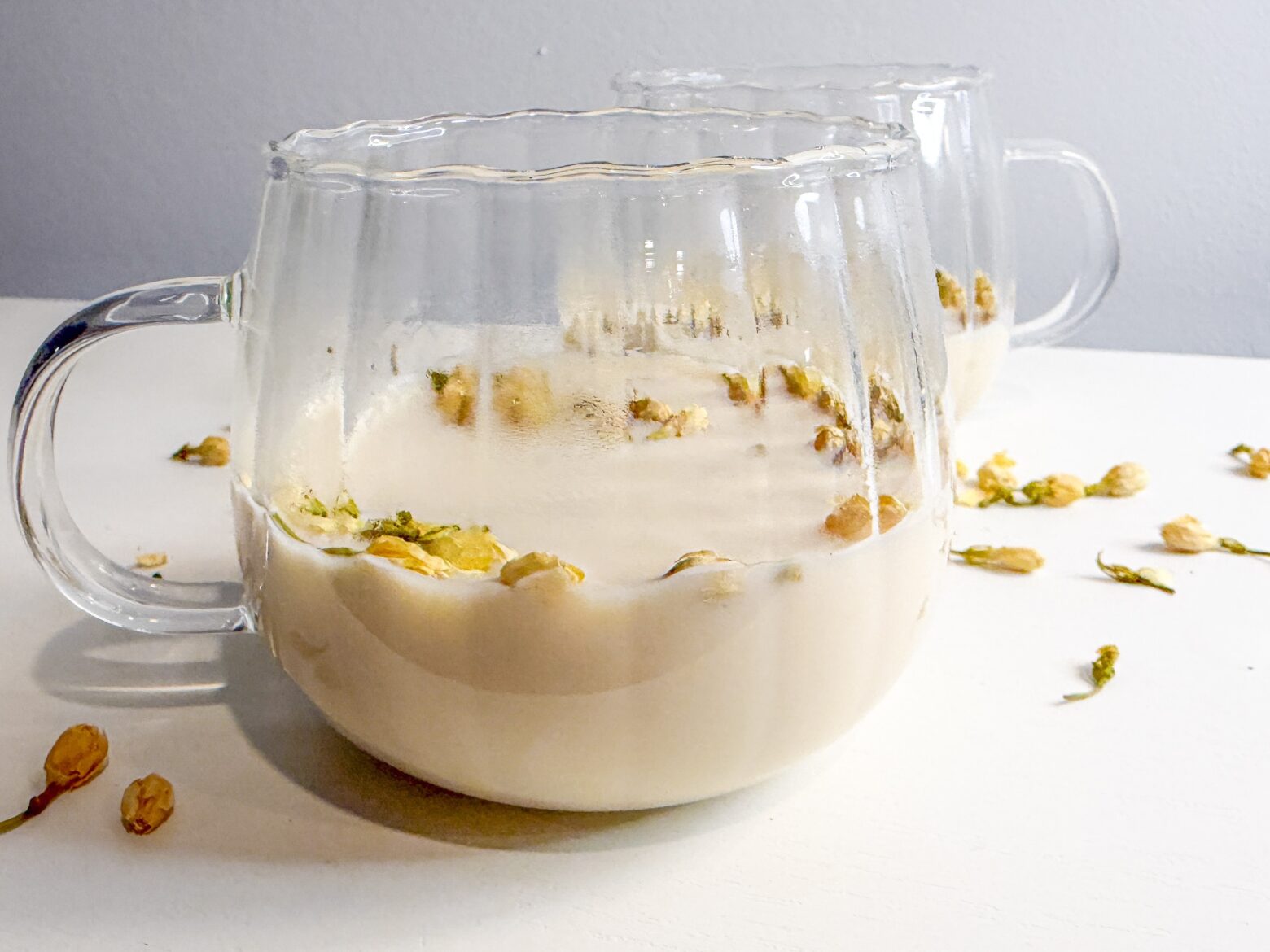 Finished Jasmine Green Tea Latte in a glass mug