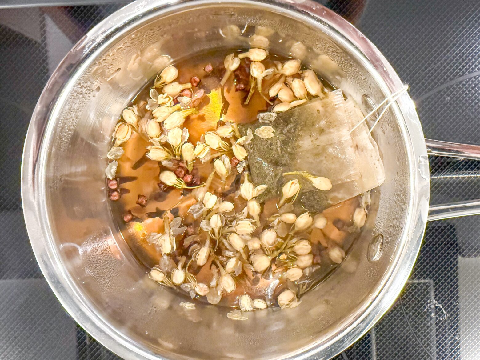 Steeping ingredients for Jasmine Green Tea Lattes.