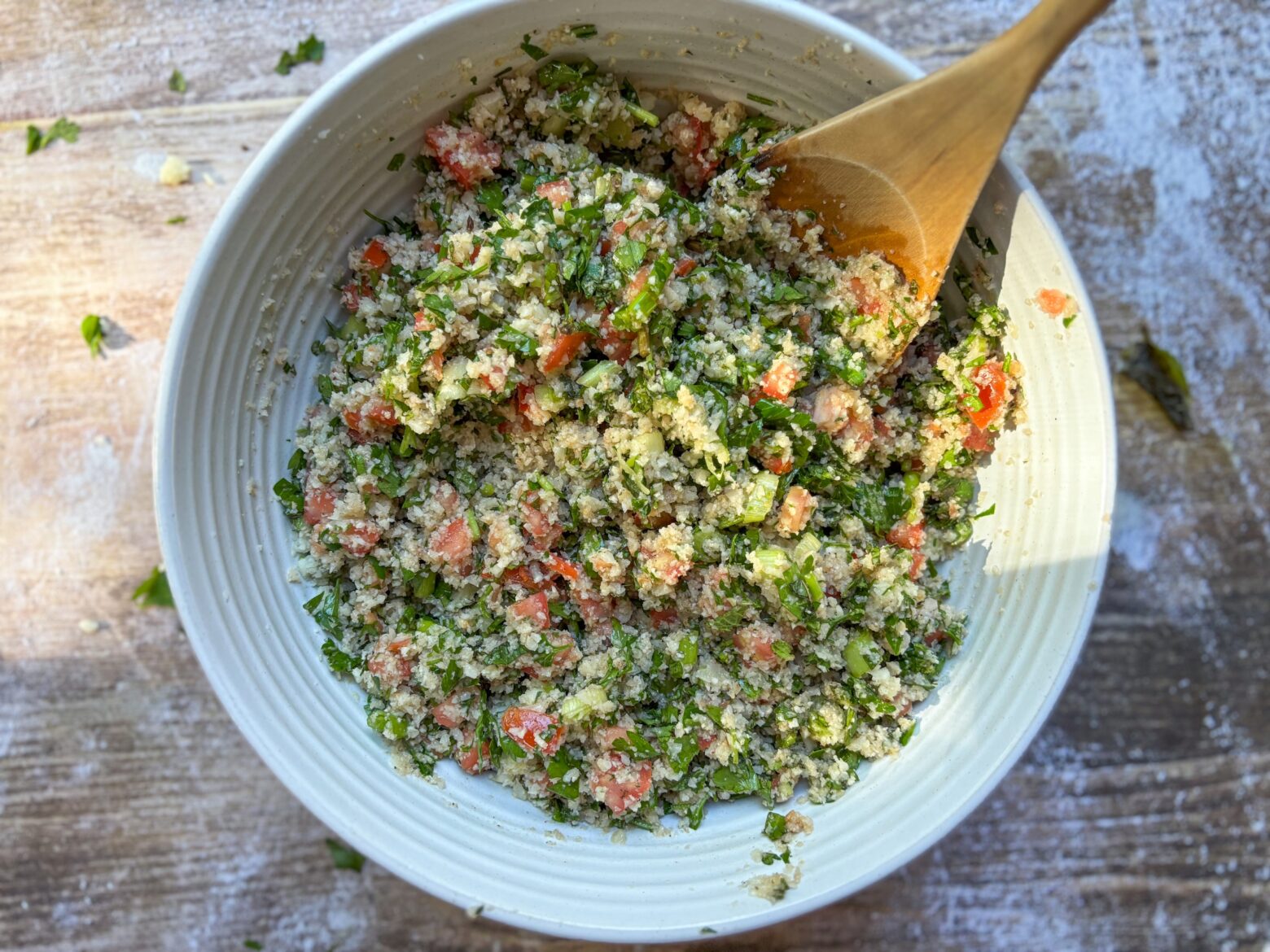 Finished Cauliflower Tabouli Salad in a bowl.