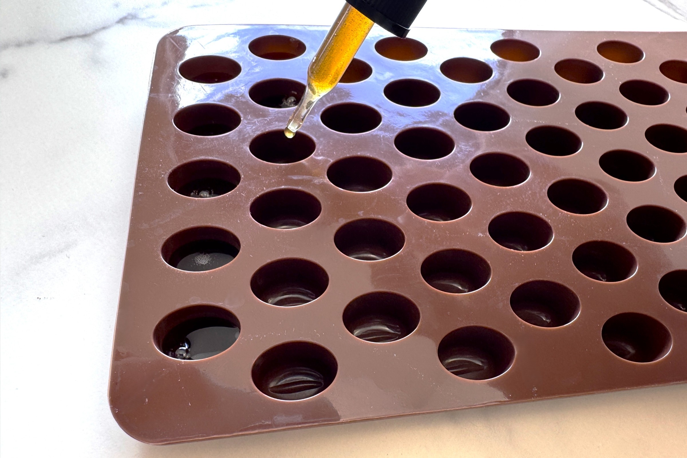 Filling molds for Coffee Jelly Energy Bites