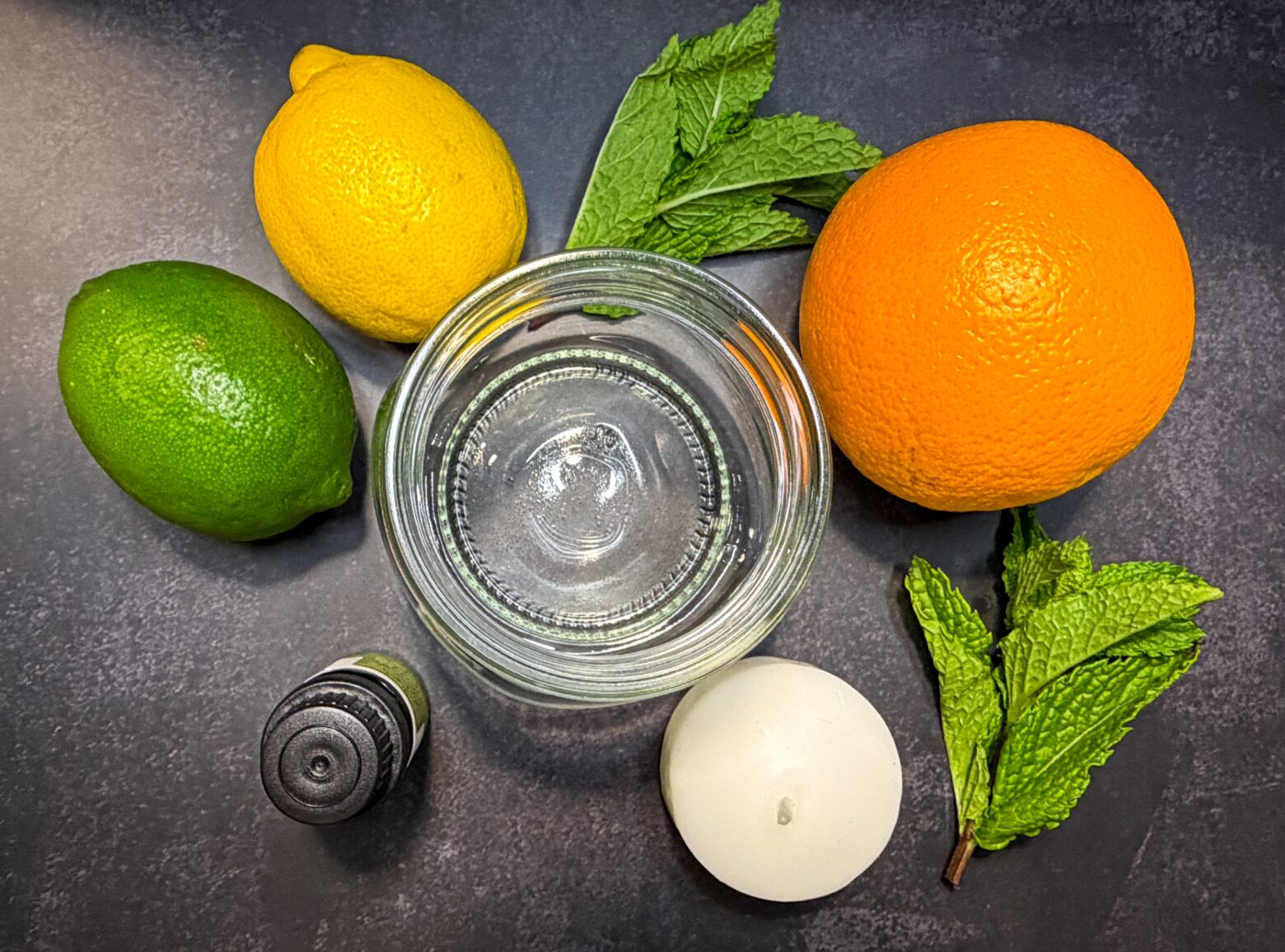 Ingredients for bee and wasp repellent candle.