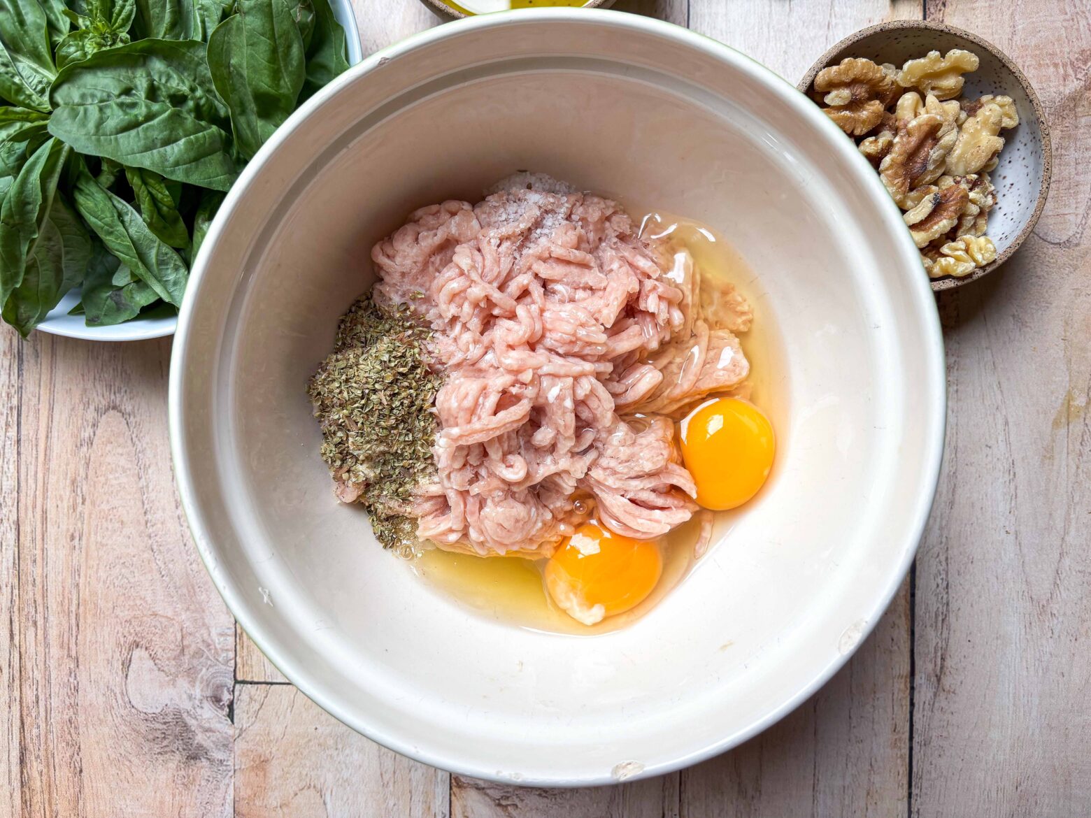 Ingredients for chicken-crust pizza base in a bowl