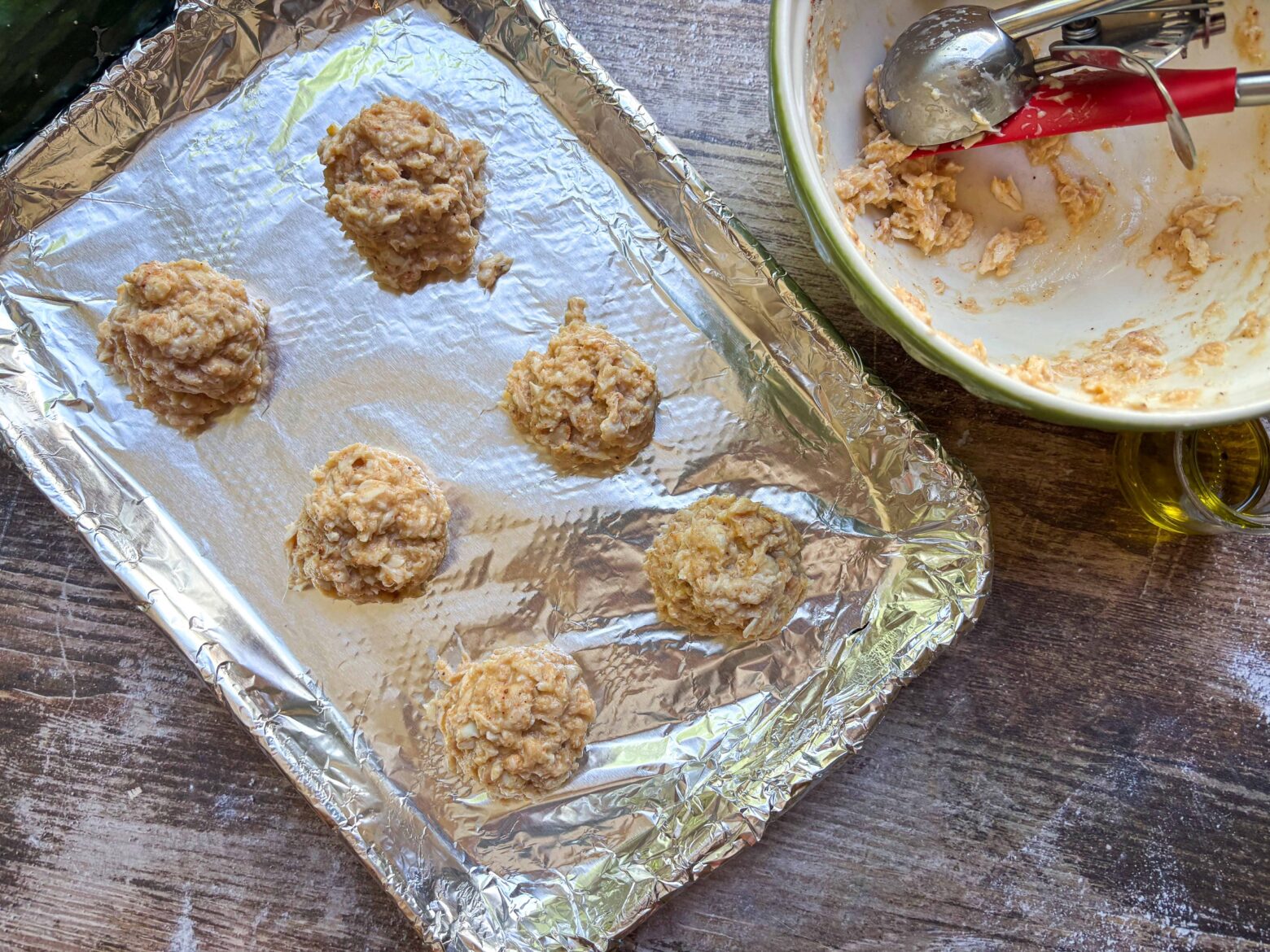 Uncooked Stuffed Crab filling on a baking sheet.