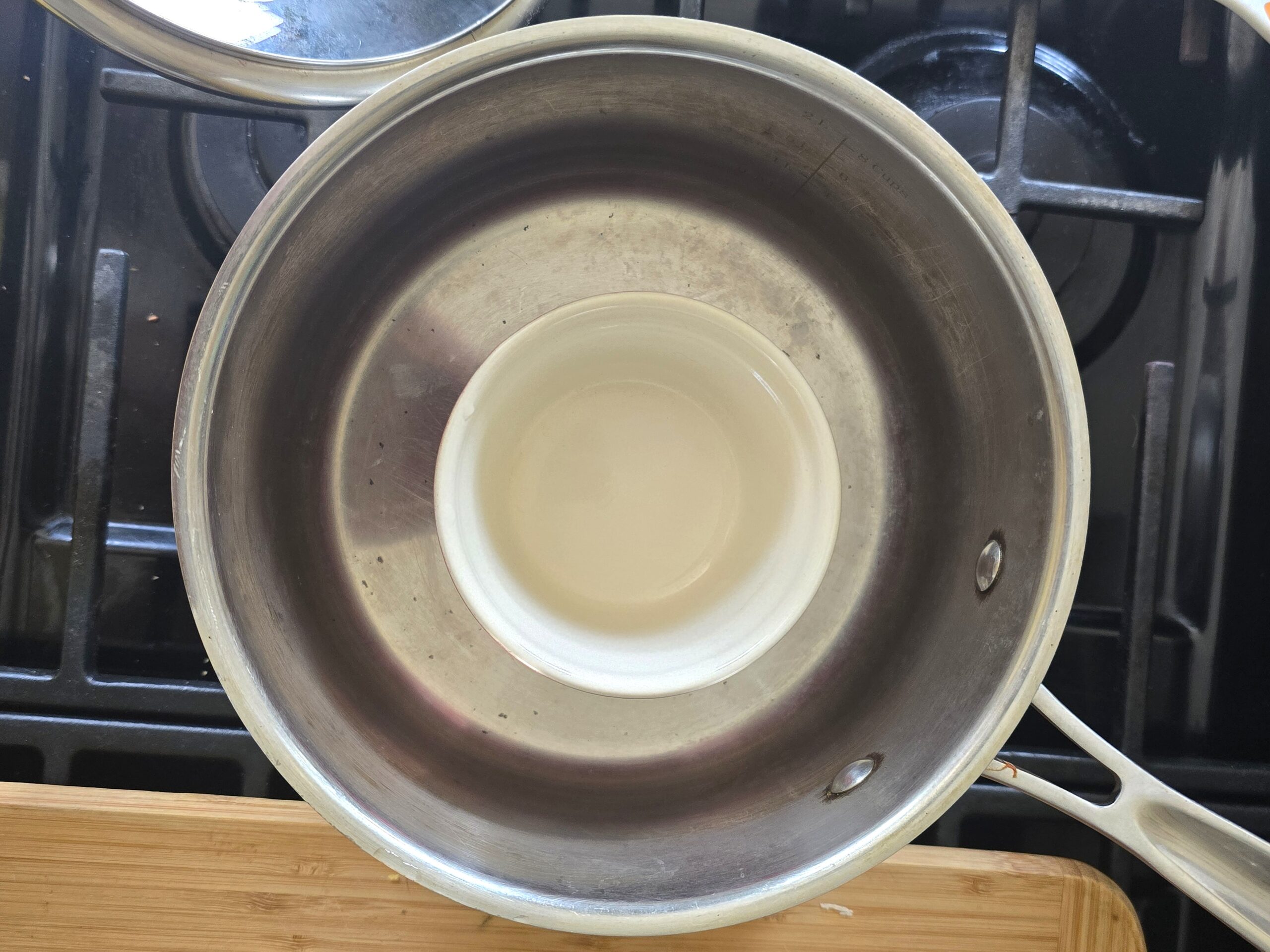 Small bowl inside a large pot