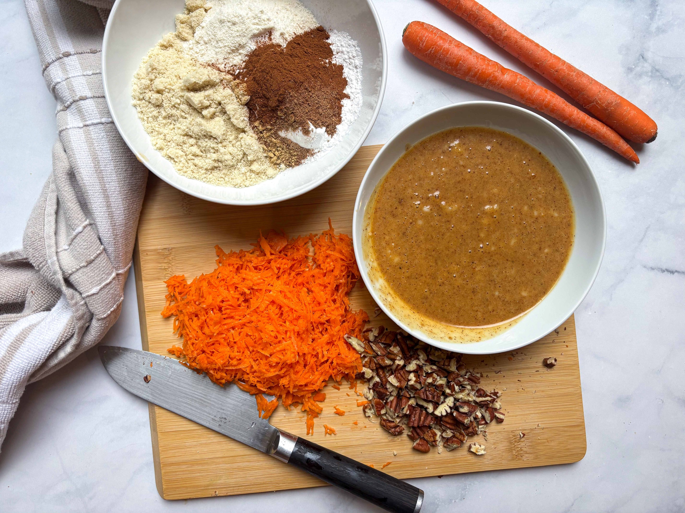 Dry and wet ingredients separated for Carrot Cake Breakfast Bars