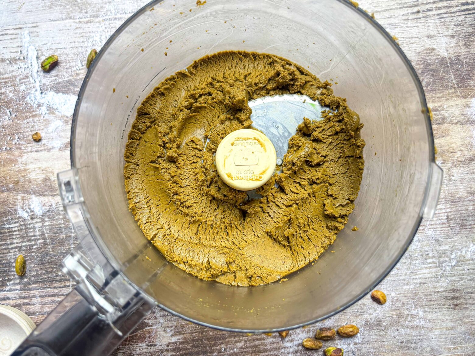 Pistachio butter blended in a food processor.