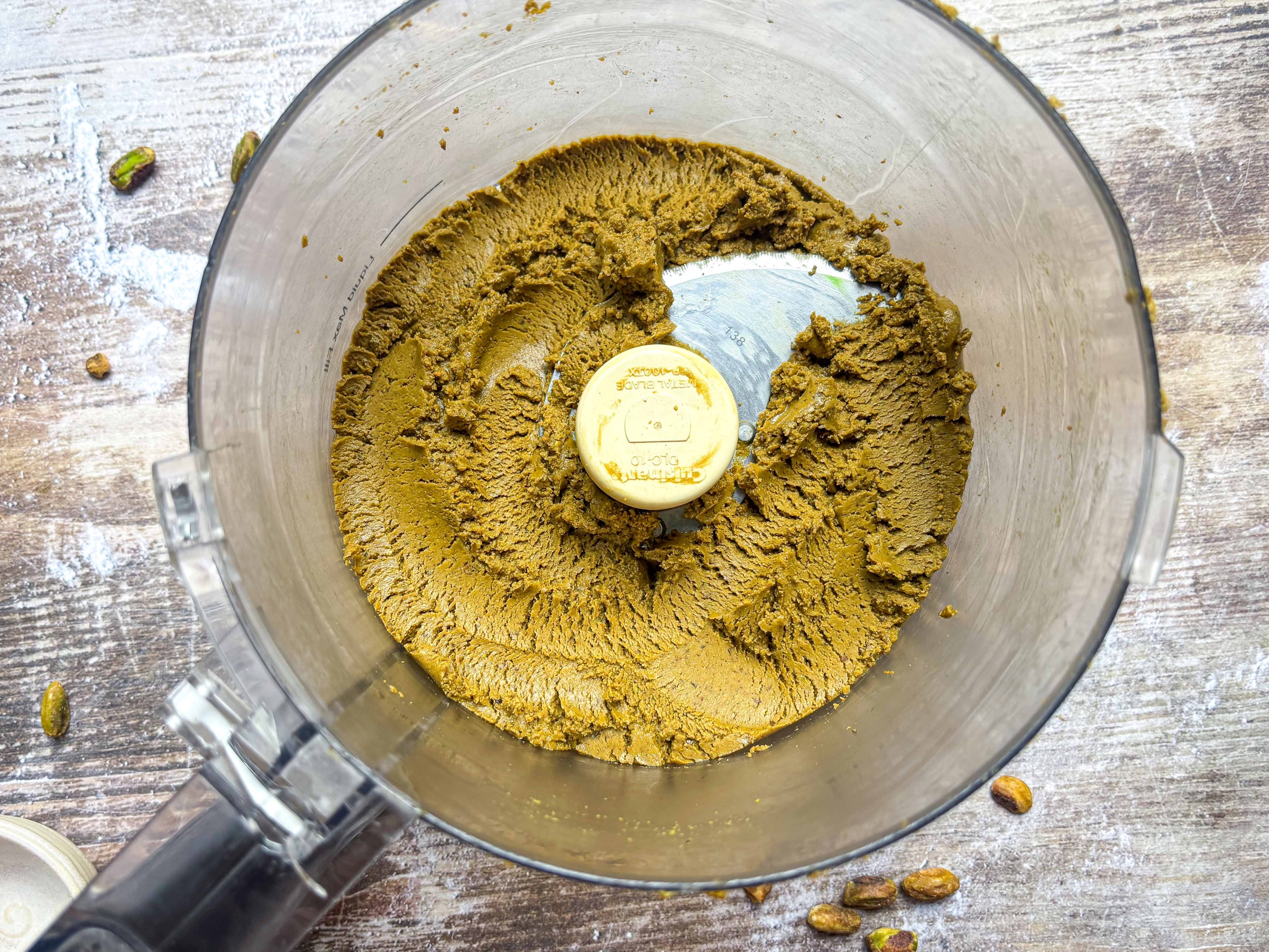 Pistachio butter blended in a food processor.