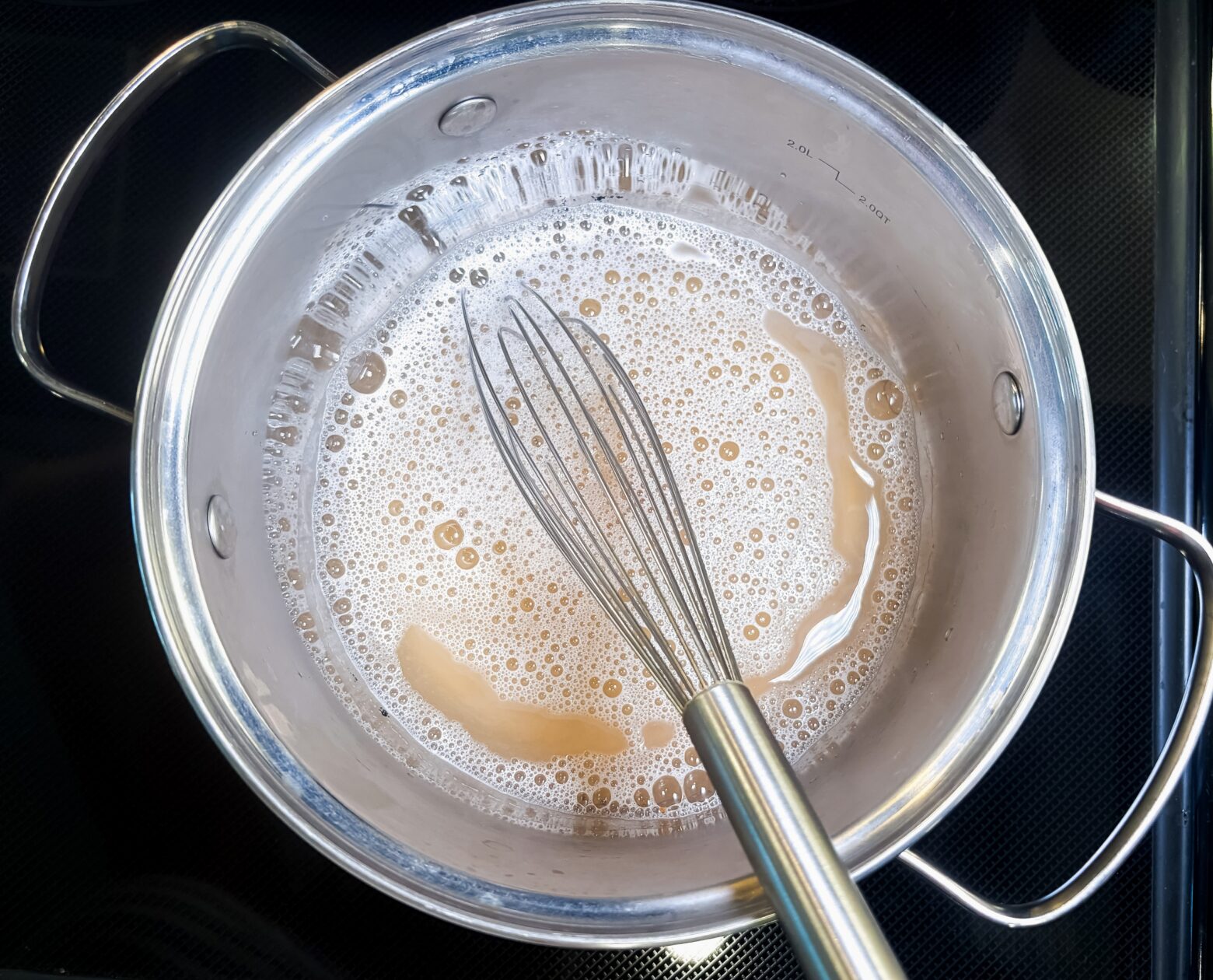 Homemade soap cooking on the stove.