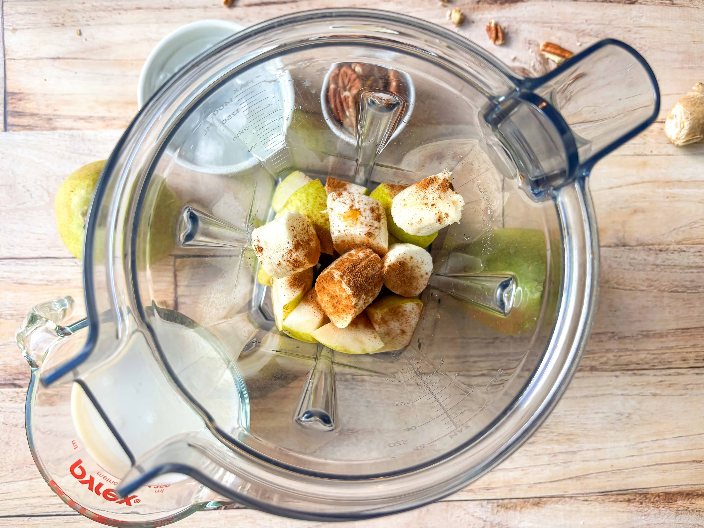 Ginger smoothie ingredients in a blender.